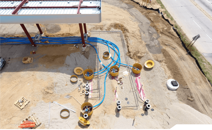 Petroleum Contracting Gas station pipes being installed with Lawrence Building Corp.