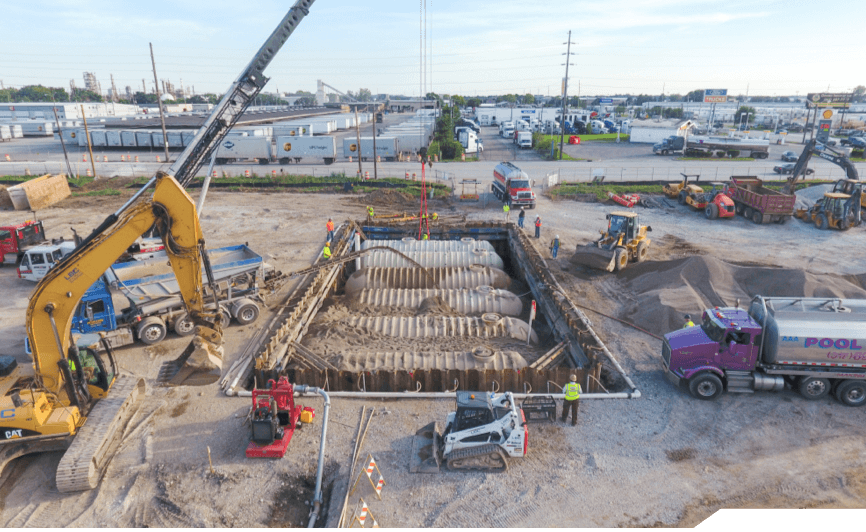 Additional Services Tank installation by Lawrence Building Corp at job site.