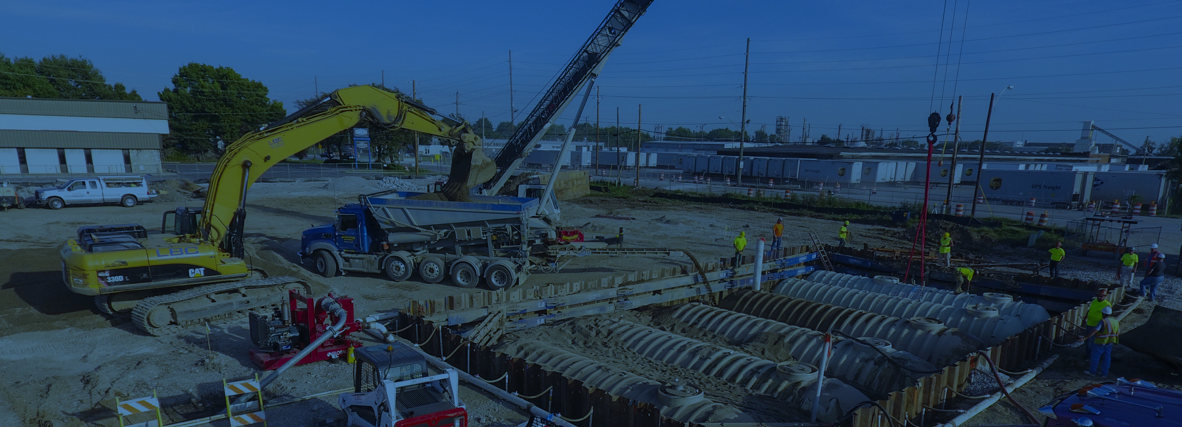Lawrence Building Corp Lawrence Building Corp petroleum contracting project construction site with blue overlay.